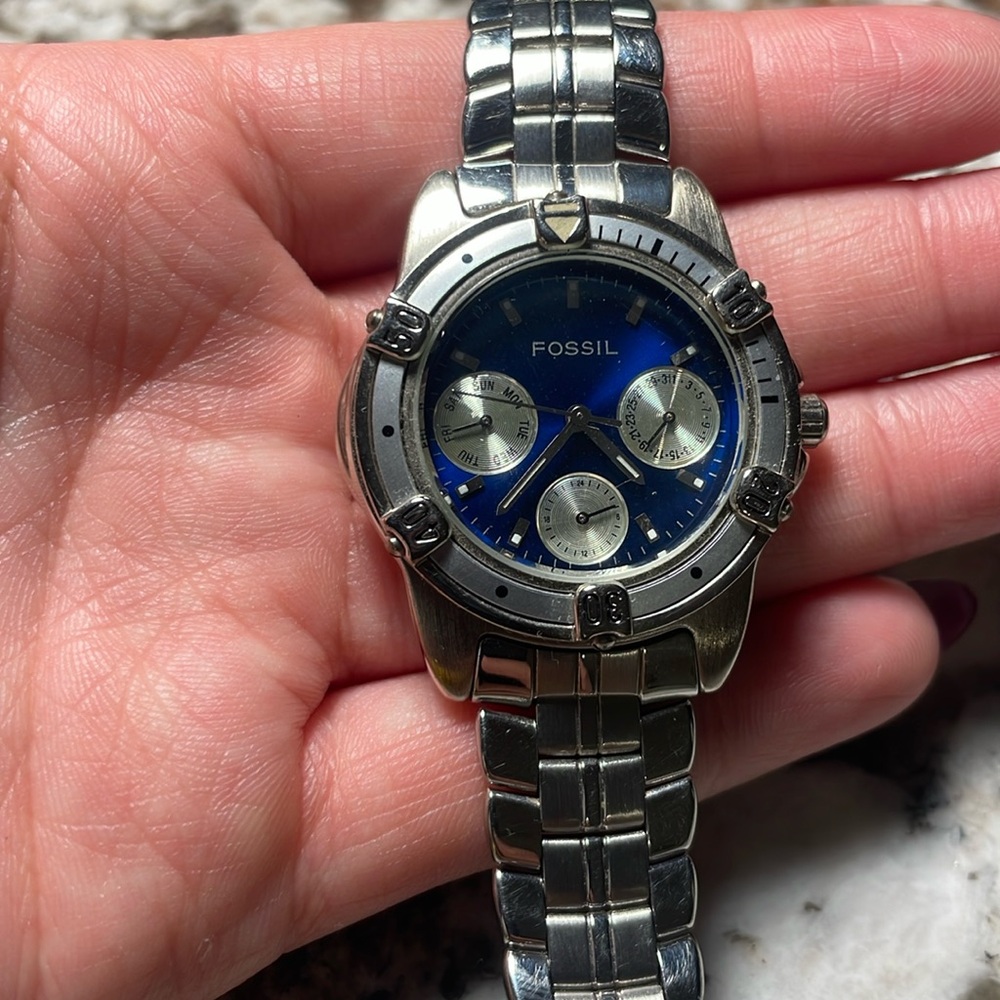Fossil watch with blue face